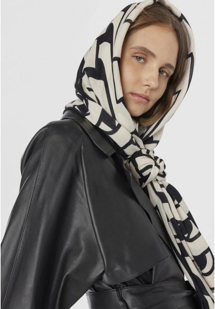 200 X 70 LOGO REPEAT NEGRO | TOUS